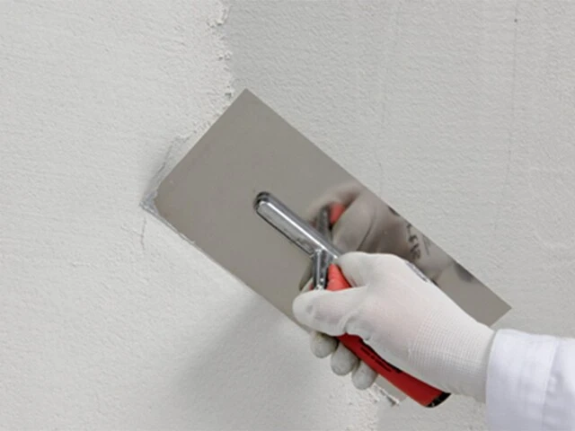 Application avec une taloche en inox