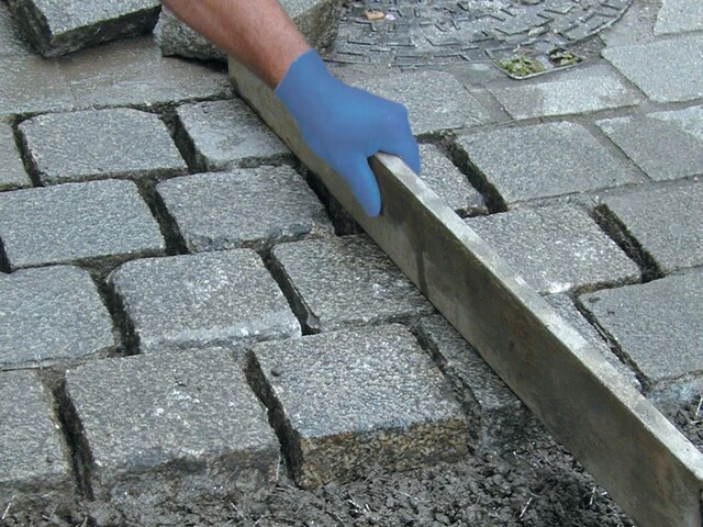 Régler les pavés à l’avancement