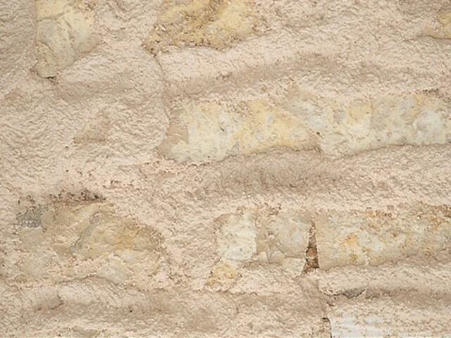Remplir les joints de la maçonnerie par projection