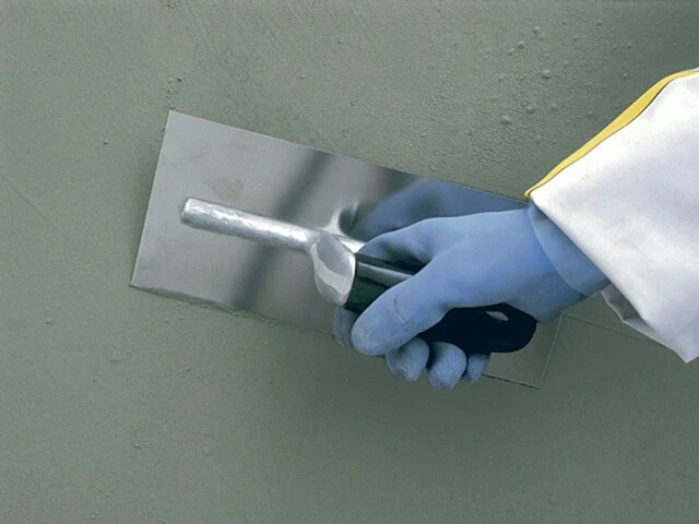 Finition lisse à la taloche inox